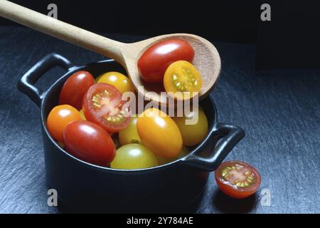 Various cherry tomatoes in pots, cherry tomato Stock Photo