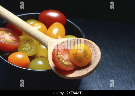 Various cherry tomatoes in pots, cherry tomato Stock Photo