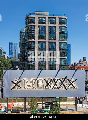 ME/AMERICA social commentary with Lantern House backdrop, viewed from NYC’s High Line at West 18th Street in Chelsea. Stock Photo