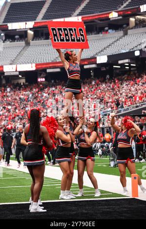 Las Vegas, NV, USA. 28th Sep, 2024. UNLV Rebels cheerleaders perform during the college football game featuring the Fresno State Bulldogs and the UNLV Rebels at Allegiant Stadium in Las Vegas, NV. Christopher Trim/CSM/Ģ����ý Live News Stock Photo