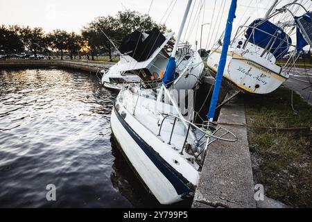 Davis Island, Florida, USA. 28th Sep, 2024. Boats which were anchored at the Davis Island Yacht Club washed up and crashed into the parking lot of the Peter O. Knight Airport on Davis Island as a result of record high storm surge caused by HURRICANE HELENE. (Credit Image: © Dave Decker/ZUMA Press Wire) EDITORIAL USAGE ONLY! Not for Commercial USAGE! Credit: ZUMA Press, Inc./Alamy Live News Stock Photo