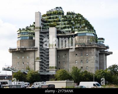 Hamburg Flakturm IV bunker building in the Feldstrasse in St. Pauli. The architecture is from world war 2 with a new green rooftop expansion. Stock Photo