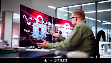 Ransomware Malware Cyber Attack On Business Computer Stock Photo