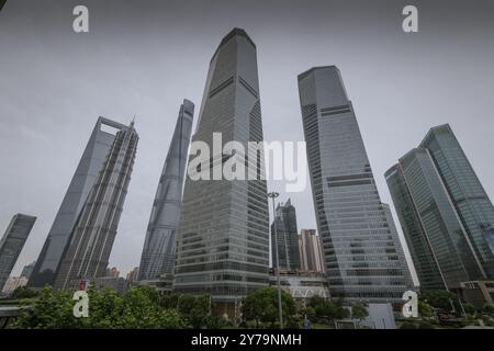 Shanghai, China - December 30, 2022: Strolling through Pudong district in Shanghai near skyscrapers. Stock Photo