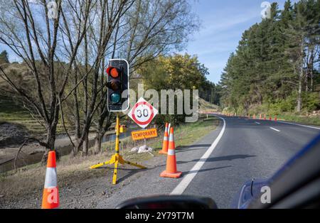 A temporary traffic light at the side of the road Stock Photo - Alamy
