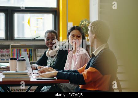 Group Of Students Studying In The Library Stock Photo