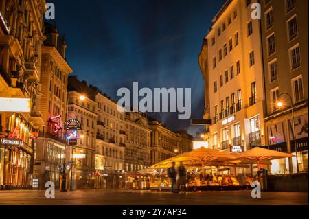 Vienna, Austria - June 6, 2022. Nightscape vienna city centre long exposure photography. Cloudscape in a city architecture building during the night t Stock Photo