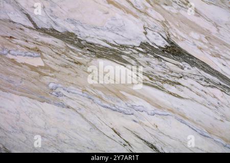 Natural marble texture with golden veins, ideal for interior design projects. Stock Photo