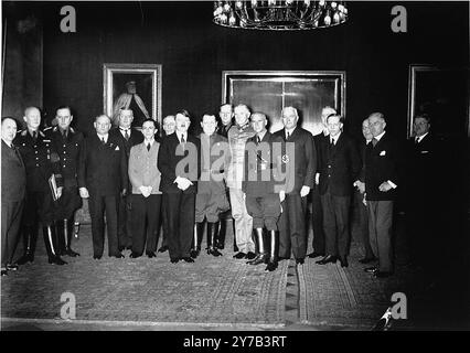 Adolf Hitler poses with members of his new government soon after his appointment as Chancellor.      Standing (from left to right) are Walther Funk, Hans Heinrich Lammers, Walther Darre, Franz Seldte. Franz Guertner. Joseph Goebbels. Paul von Eltz-Ruebenach, Adolf Hitler; Hermann Goering, Kurt Schmitt, Werner von Blomberg, Wilhelm Frick, Constantin Freiherr von Neurath, Hjalmar Schacht, Lutz Graf Schwerin von Krosigk, Johannes Popitz, Franz von Papen, and Otto Meissner. Stock Photo