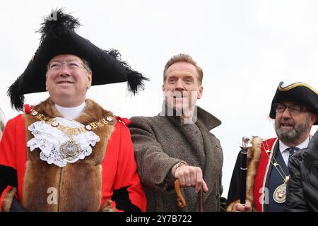 London, UK, 29th September 2024. Hollywood actor Damian Lewis became would-be shepherd for the day as he herded a group of sheep over Southwark Bridge.  The sheep first received a blessing and then Damian was joined by Lord Mayor of London Michael Mainelli,  Master Woolman Manny Cohen, and Sheriffs of the City, as they took up their historic entitlement to drive their sheep over the River Thames toll free, in the big fundraising event. Credit : Monica Wells/Alamy Live News Stock Photo