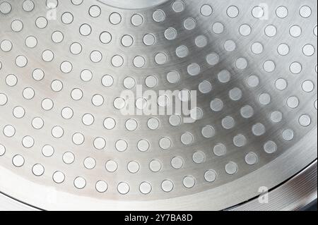 Stainless metal sheet with circles background close up view Stock Photo