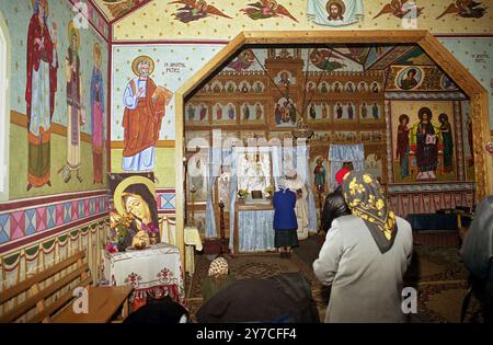 Sihastria Rarau Monastery, Campulung Moldovenesc, Romania, approx. 1999. Believers during the Liturgical service in the Christian Orthodox church. Stock Photo