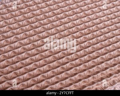 Carton packing material. Texture of corrugated paper made from recycled paper. Close up. Stock Photo
