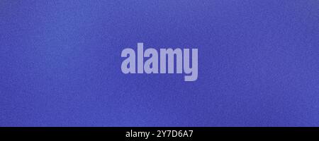 Vivid blue gradient background with a subtle, grainy overlay suitable for designs and graphics Stock Photo