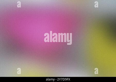 The transition from pink to yellow in a textured, grainy gradient Stock Photo