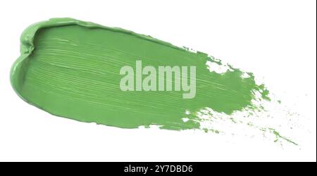 Green paint brush stroke isolated on white background, smudged makeup Stock Photo