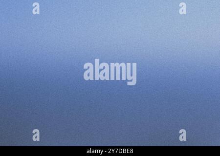 Captivating highresolution photo featuring a textured grainy surface in a calming blue gradient Stock Photo