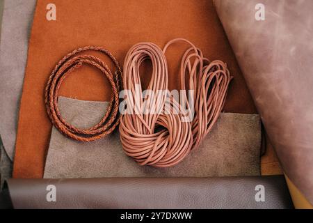 Genuine leather set and cord in brown color. Leather wallpaper.Leather ...