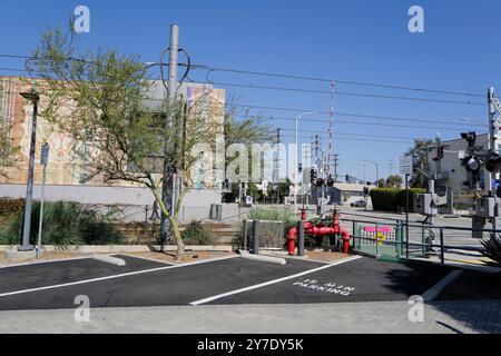 A detailed look at various backflow prevention valves and fire safety systems installed around an industrial site. Stock Photo