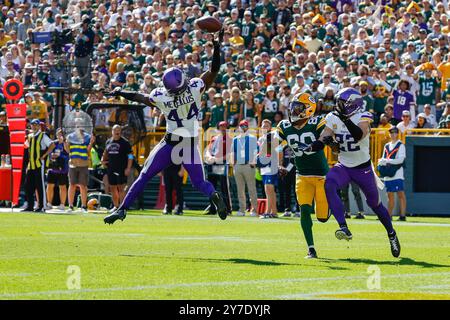 Green Bay, Wisconsin, USA. 29th Sep, 2024. Minnesota Vikings safety Josh Metellus (44) breaks up a pass intended for Green Bay Packers wide receiver Bo Melton (80) during the NFL football game between the Minnesota Vikings and the Green Bay Packers at Lambeau Field in Green Bay, Wisconsin. Darren Lee/CSM/Alamy Live News Stock Photo