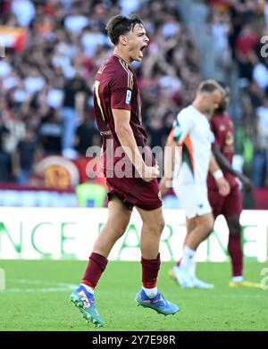 Rome, Italy. 29th Sep, 2024. Roma's Niccolo Pisilli celebrates his goal during a Serie A soccer match between Roma and Venezia in Rome, Italy, Sept. 29, 2024. Credit: Alberto Lingria/Xinhua/Alamy Live News Stock Photo