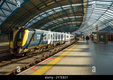 Interior of Waterloo Station London, showing platform leading to South West Trains train track Stock Photo