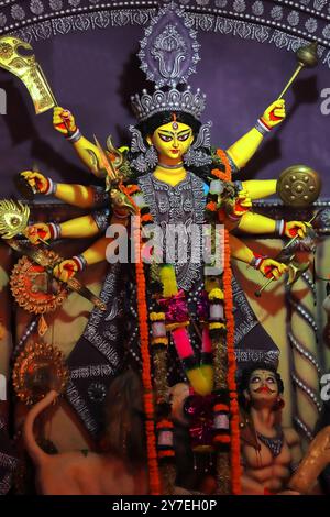 happy durga puja, idol of hindu goddess maa durga at puja pandal in west bengal, india. famous religious festival of bengal and india Stock Photo