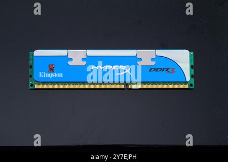 A DIMM of DDR3 SDRAM with a heatsink, worldwide Stock Photo