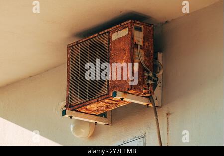 Old rusty air conditioner external unit, selective focus Stock Photo