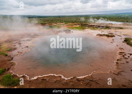 The Geysir Hot Springs in Haukadalsvegur, Iceland During a Summer Day Stock Photo