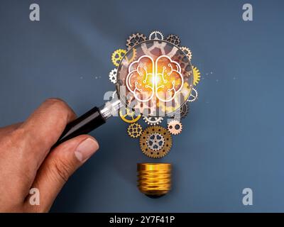 AI Innovative technology, solution, creative, inspiration tools service concept. Digital brain icon in magnifier lens on many mechanic gears and cogwh Stock Photo