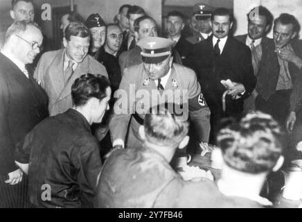 The Duke of Windsor with a Berlin factory worker during his tour, Centre is Dr Robert Ley October 11th 1937 Stock Photo