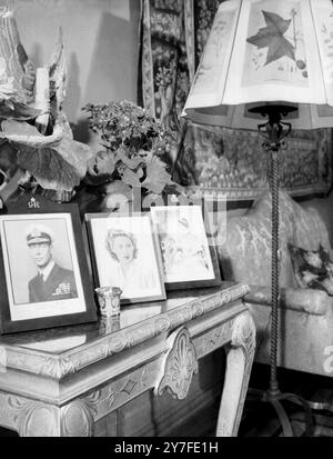 Portraits of the King, the Queen and Princess Margaret decorate a corner of the Reception Room in the British Embassy in Rome, where the  Duke of Edinburgh and Princess Elizabeth will live during their 12 day visit to this city.  10th April 1951 Stock Photo