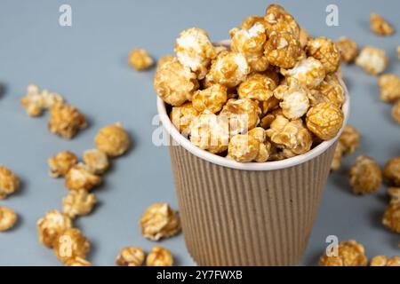 Sweet caramelized popcorn top view close up. Stock Photo