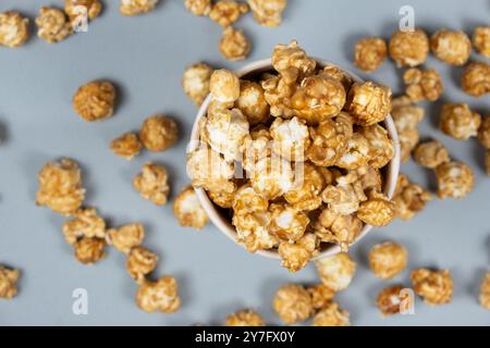 Sweet caramelized popcorn top view close up. Stock Photo