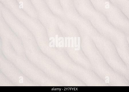 Diagonal pattern of ripples in the sand of the beach, caused by the wind Stock Photo