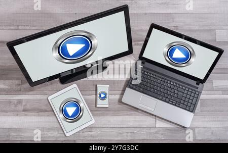 Play concept shown on different information technology devices Stock Photo