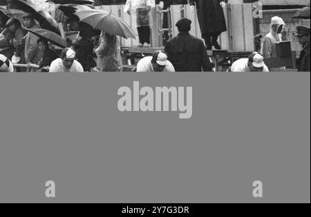 Pictured at Hachioji , Japan , are the road racing team of the USSR seen in action during the team time trials in cycling .   15th October 1964 Stock Photo