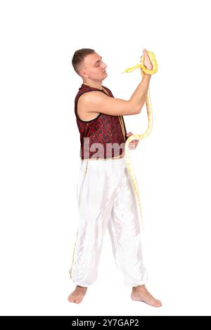 Young Caucasian man with Tiger Albino python Stock Photo