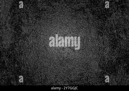 Rough embossed glossy black surface Stock Photo