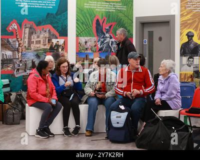 Passengers prepare to board the Villa Vie Odyssey cruise ship at Belfast Port's Cruise Ship Terminal, after the luxury cruise ship became marooned in Belfast for four months due to unexpected repair works. Picture date: Monday September 30, 2024. Stock Photo