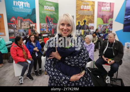 Passengers prepare to board the Villa Vie Odyssey cruise ship at Belfast Port's Cruise Ship Terminal, after the luxury cruise ship became marooned in Belfast for four months due to unexpected repair works. Picture date: Monday September 30, 2024. Stock Photo