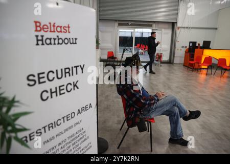 Passengers prepare to board the Villa Vie Odyssey cruise ship at Belfast Port's Cruise Ship Terminal, after the luxury cruise ship became marooned in Belfast for four months due to unexpected repair works. Picture date: Monday September 30, 2024. Stock Photo