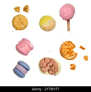 Broken round macarons with crumbs on a white background, delicious dessert, top view Stock Photo