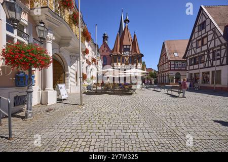 Market square with lantern, outdoor area of a cafe and historic town hall in Michelstadt, Odenwald, Odenwaldkreis, Hesse, Germany, Europe Stock Photo