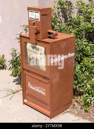 Old metal and newspaper in a small window Stock Photo - Alamy