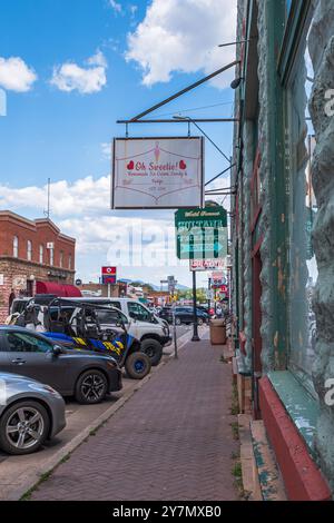 Different signs for businesses on Historic Route 66 in Williams, Arizona, USA Stock Photo