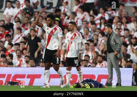 Buenos Aires, Argentina. 29th Sep, 2024. X () vies for the ball with X during the Argentine Professional Football League Tournament 2024 'Cesar Luis Menotti' match at El Monumental stadium in Buenos Aires, on September 29, 2024. Credit: Alejandro Pagni/Alamy Live News Stock Photo