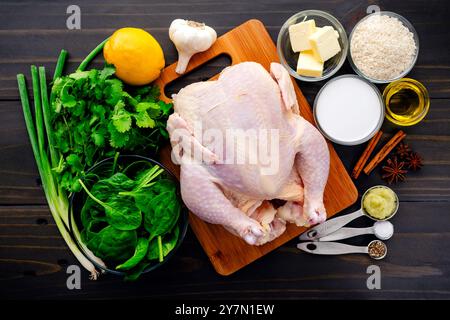 Chicken in Coconut Milk with Lemongrass Ingredients: Whole chicken, cilantro, lemongrass paste, and other ingredients for roasted chicken Stock Photo