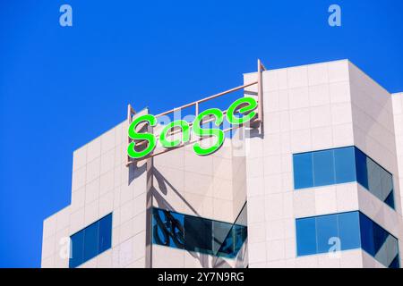 Sage sign, logo on the facade of corporate headquarters building of Sage Intacct, an American provider of cloud-based accounting software and services Stock Photo